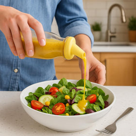 Kitchentoolz bottle with silicone pour spout for controlled, mess-free pouring.