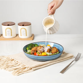 KitchenTour bowls feature a vibrant speckled glaze for lively tables