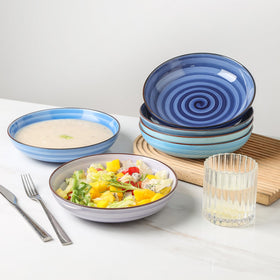 KitchenTour porcelain serving bowls showcasing a colorful speckled glaze