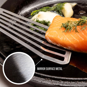 Kitchenware King grilling spatula in action; versatile tool for outdoor barbecues and skillet searing.