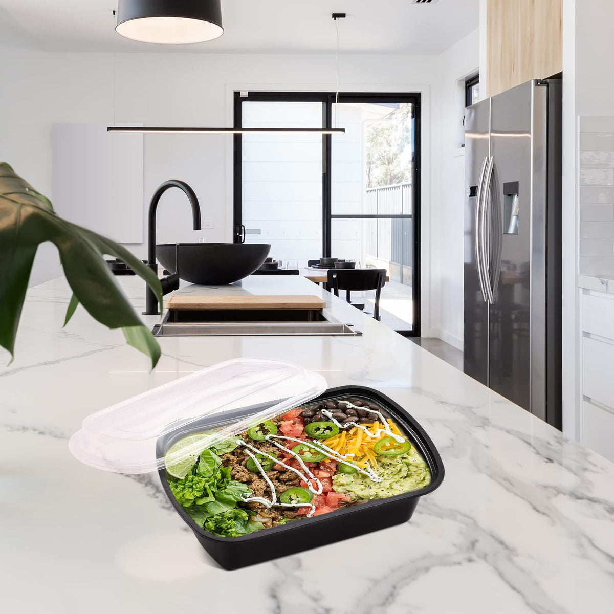 Kitch’nMore microwave-safe containers for quick reheating at home.