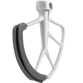 KITCHPOWER Flex Edge Beater side-scrape shows thorough bowl scraping for even mixing.