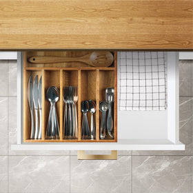 KITEISCAT multipurpose tray supports utensils and gadgets in one organized space.