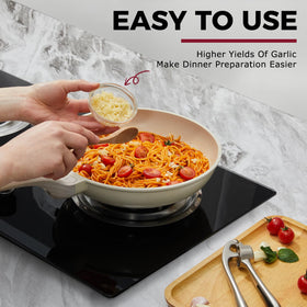Kitessensu garlic press in kitchen setting emphasizes durable zinc construction
