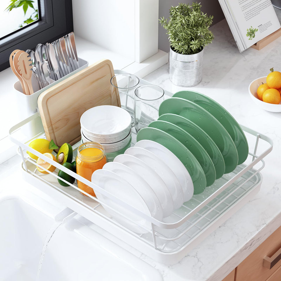 Kitsure dish drying rack on a white counter, space-saving organization for plates and glasses.