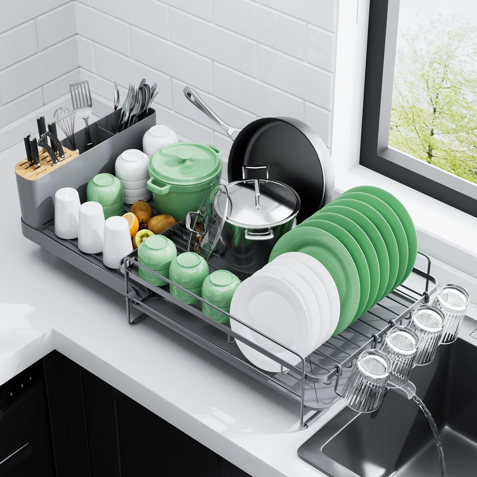 Kitsure extendable dish drying rack demonstrates adjustable length for versatile counter use.