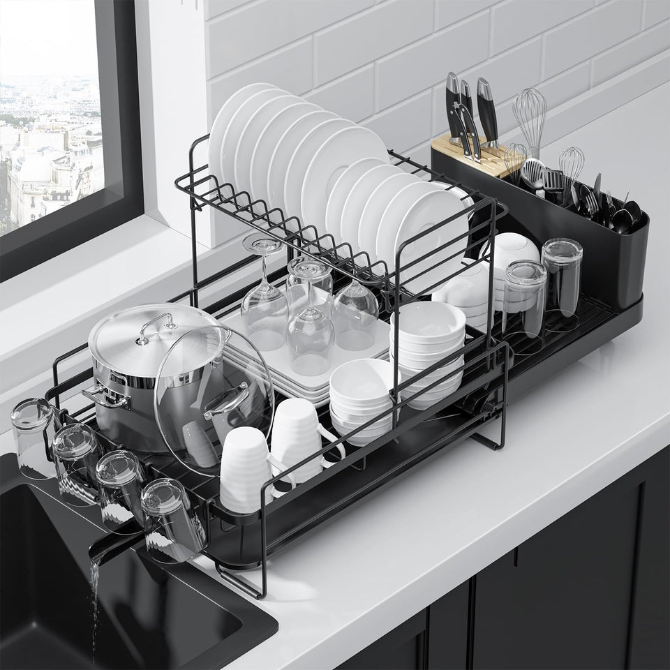 Kitsure extendable dish drying rack on counter, adjustable for varying kitchen sizes.
