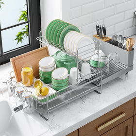 Kitsure extendable dish drying rack on a compact counter showing adjustable length for tight spaces