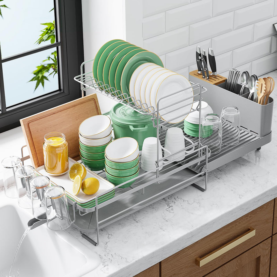 Kitsure extendable dish drying rack on a compact counter showing adjustable length for tight spaces