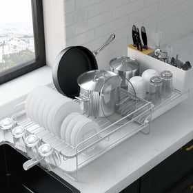 Kitsure extendable dish drying rack expanded on a kitchen counter showing space-saving design