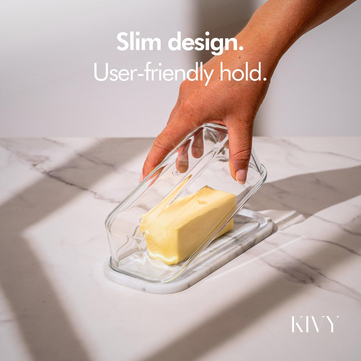 KIVY butter dish closeup shows marble texture and premium finish.