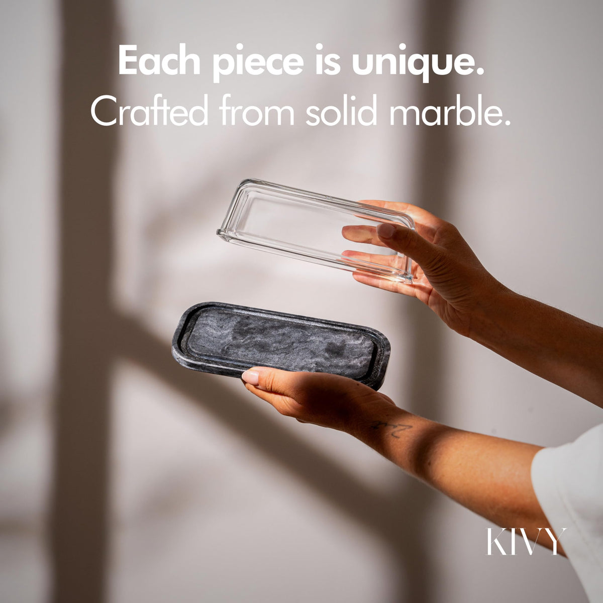 KIVY butter dish on a countertop showcases elegant marble texture and tidy storage.