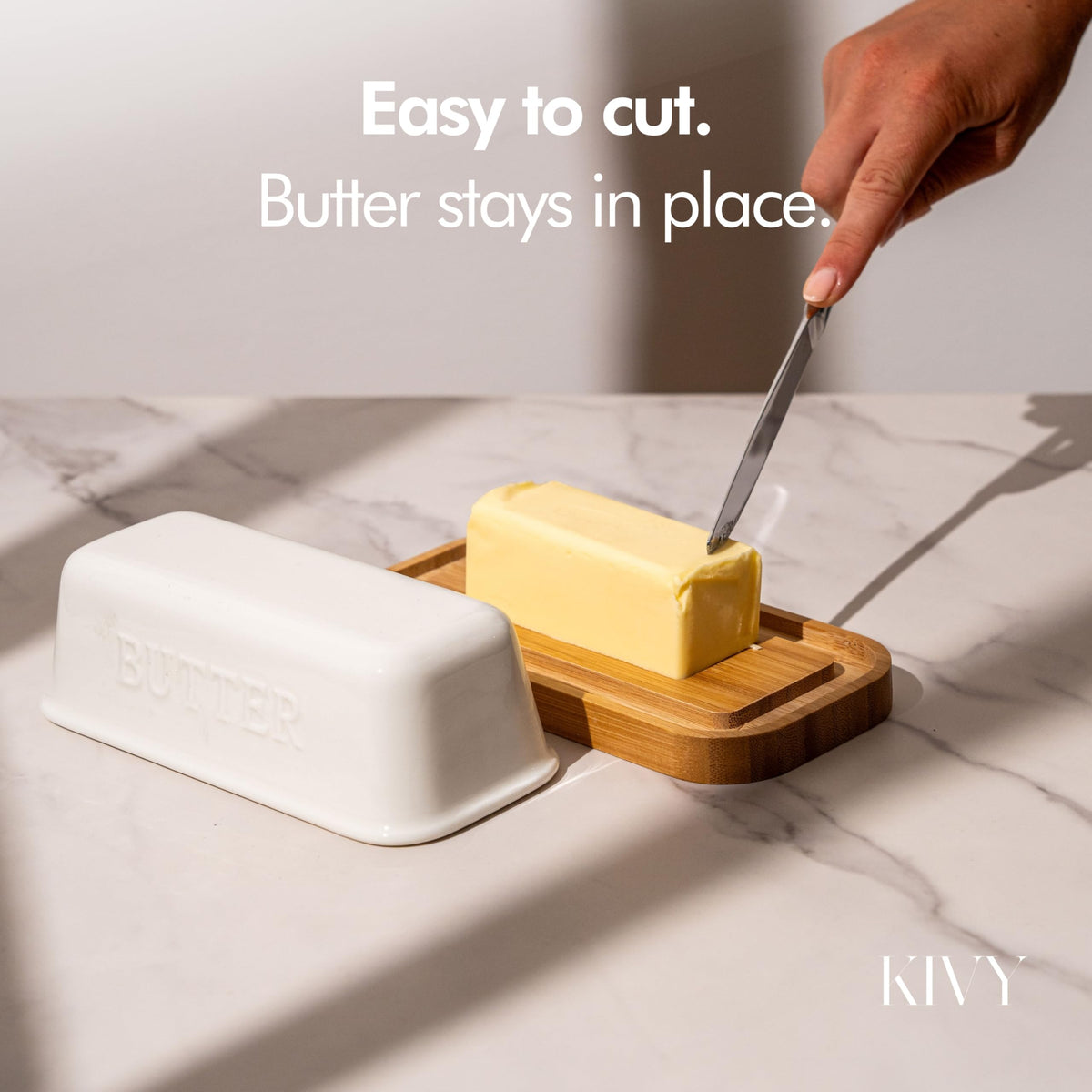 KIVY butter plate with bamboo base adds natural warmth and stability.