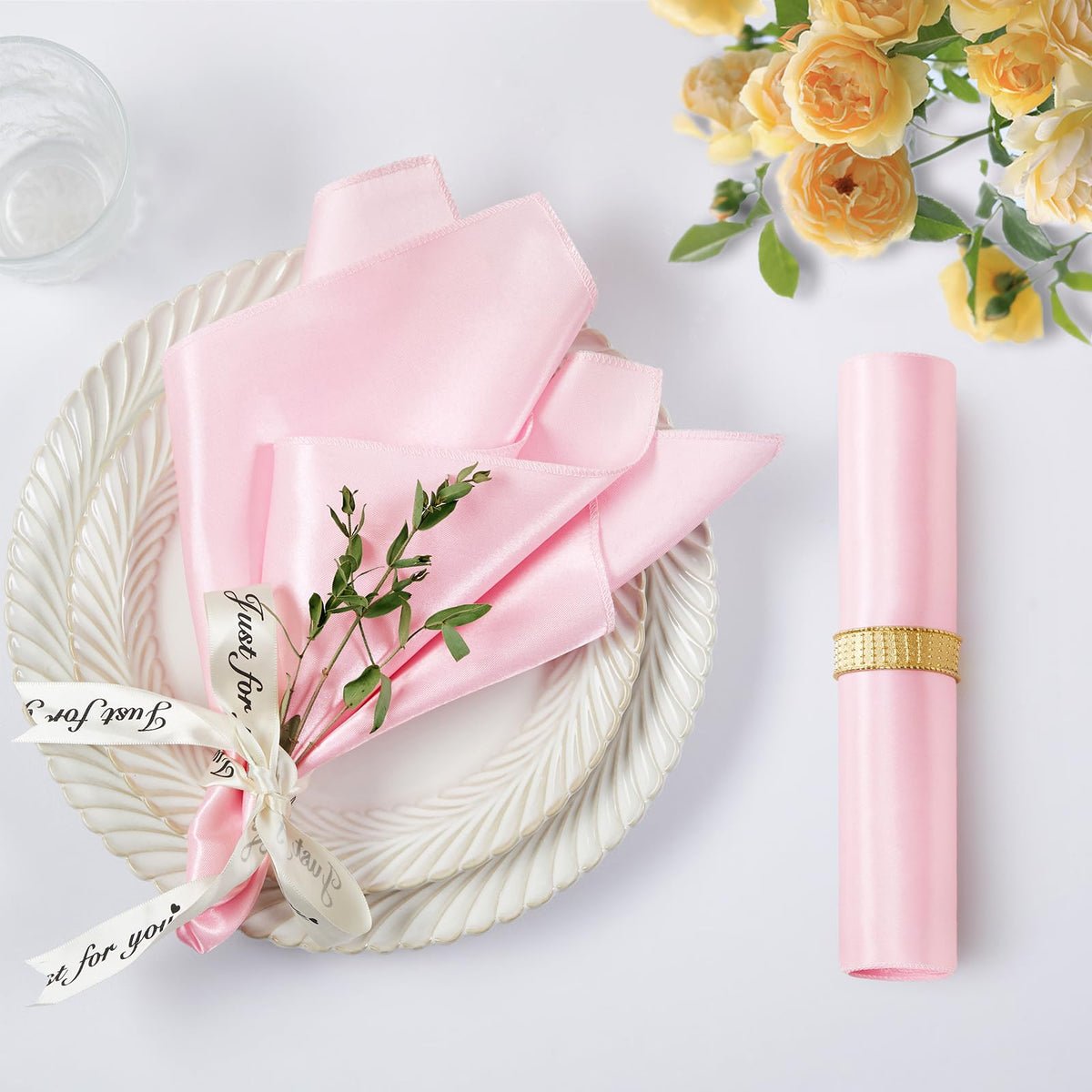 KKJIAF 17x17 satin napkin folded in an elegant wedding table setting.