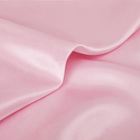 KKJIAF care tips for satin napkins including machine wash and low heat drying.
