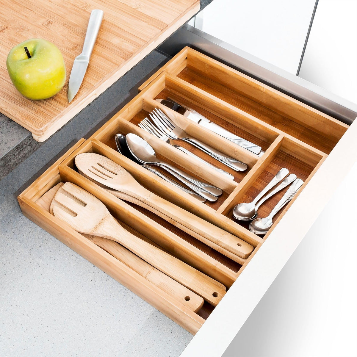 Non-slip pads keep the organizer steady in a busy drawer