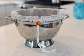 Cord lock detail on Kleynhuis strainer pouch showing secure closure