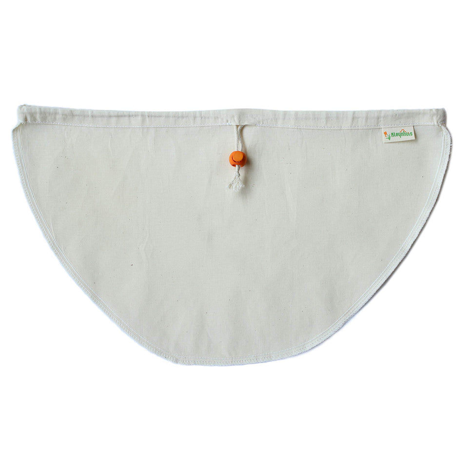 Kleynhuis Greek Yogurt Strainer Pouch opened over a colander for drainage