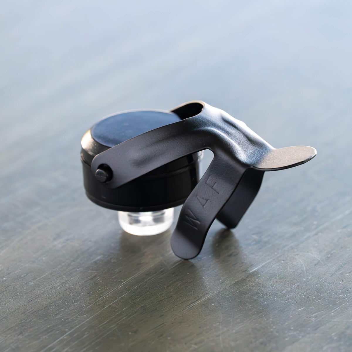 KLOVEO champagne stopper on a standard 750ml neck, Prosecco and Cava compatible.