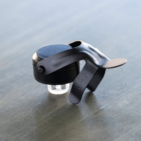 KLOVEO champagne stopper on a standard 750ml neck, Prosecco and Cava compatible.