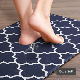 KMAT blue on wood floor placement illustrates large, rectangular mats