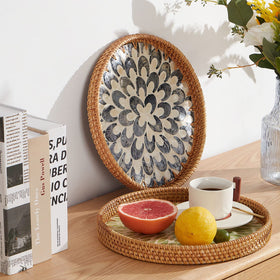 Kmelep decorative wicker basket tray enhances Bohemian dining room decor.