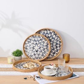 Kmelep natural rattan fruit tray for snacks or small items.