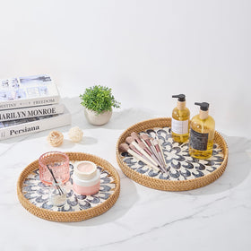 Kmelep rattan serving tray with wall-hanging option for artful decor.