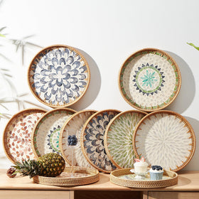 Kmelep wall-hanging rattan tray adds Bohemian texture to living spaces