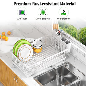 Kmiectse dish drying rack features rapid-drain system to keep counters dry after washing dishes.