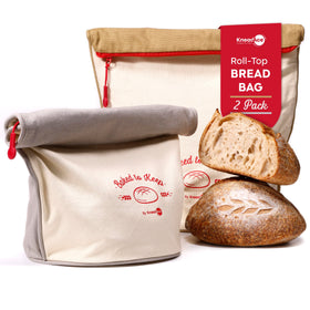 KNEADACE bread bag with roll-top design keeps loaves fresh on the counter.