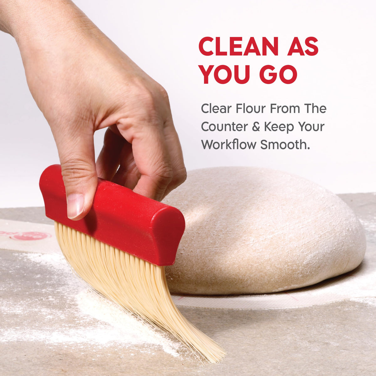 KneadAce flour-dusting tool in action for even flour distribution