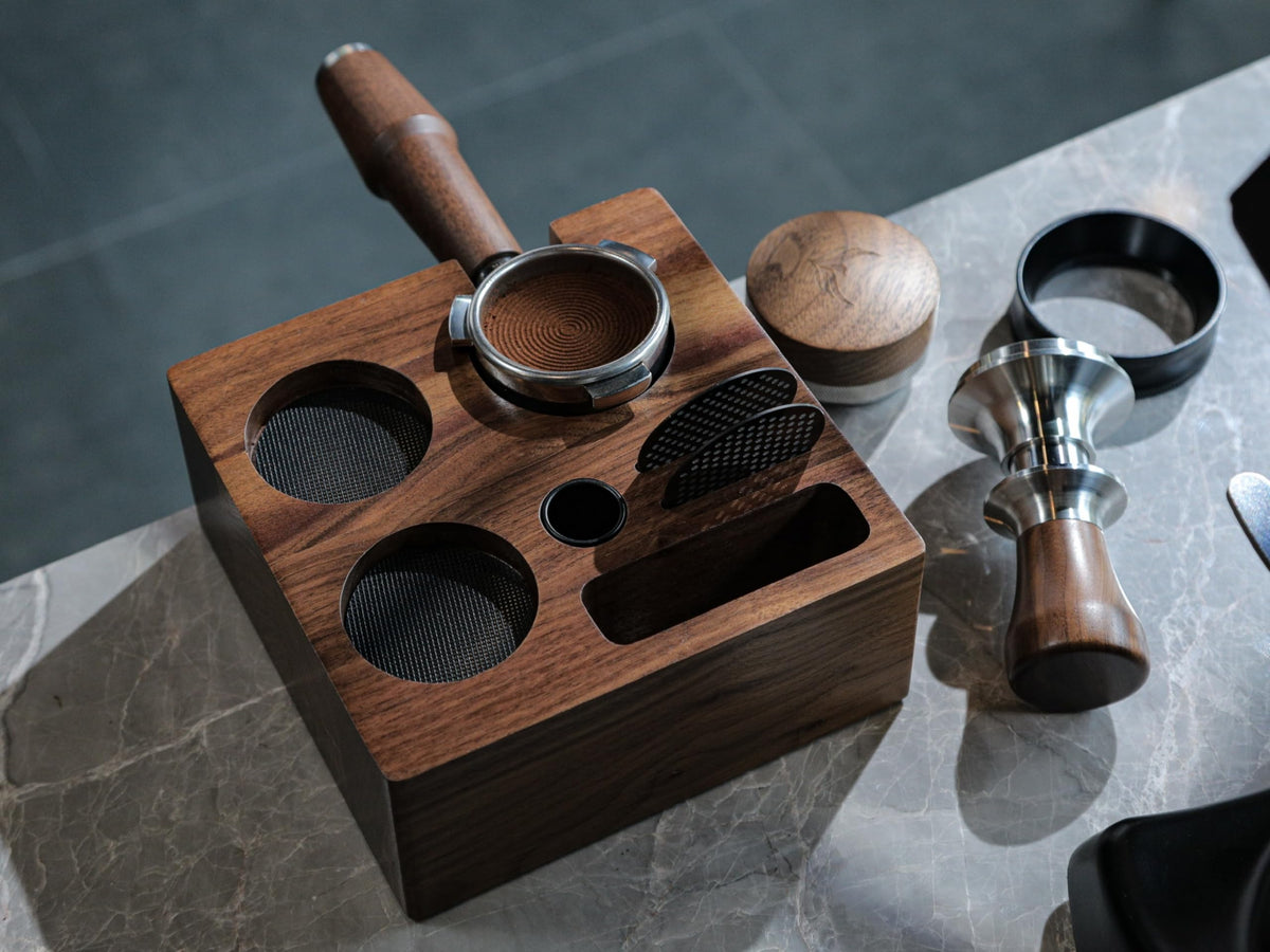 KNODOS coffee brush and tamper mat holder arranged for quick maintenance and workflow