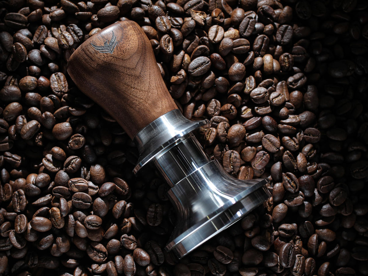 KNODOS tamper with spring-loaded system delivering steady pressure for even puck