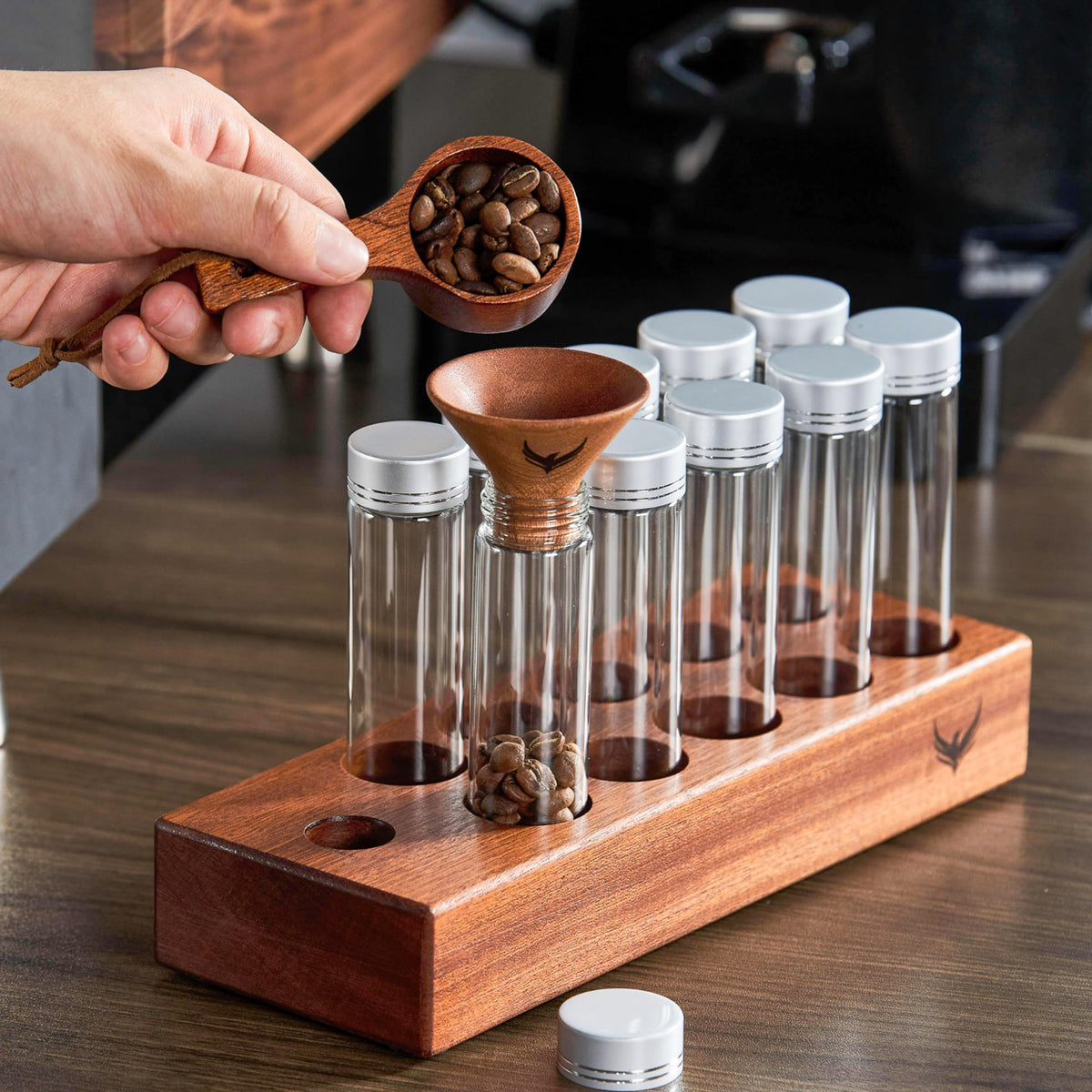 KNODOS wooden base holder keeps tubes organized on the counter.