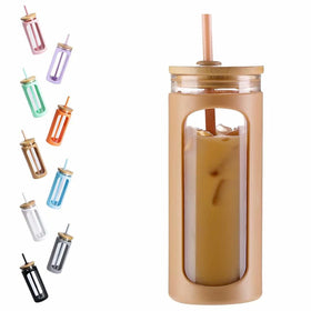 Kodrine 20oz glass tumbler with straw and lid in amber, ideal for iced beverages on the go.