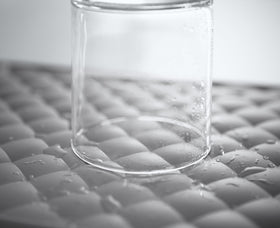 Kohler K-8628-CHR stemware storage rack organized in a cabinet
