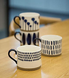 Koja four-mug set on display showcasing decorative patterns and gifting appeal