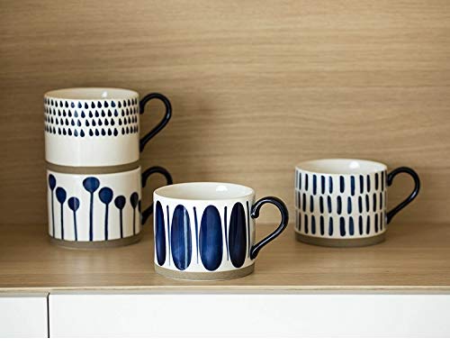 Koja mug handle detail emphasizing comfortable grip during hot beverages