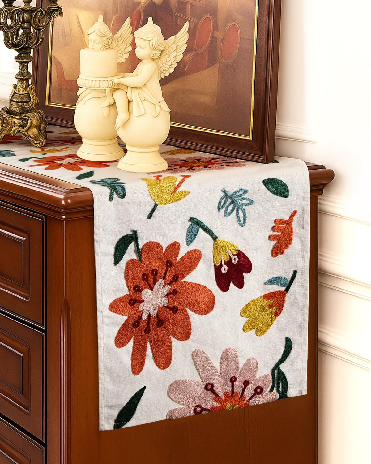 Draped ends of the Kokaaee runner create elegant table lines