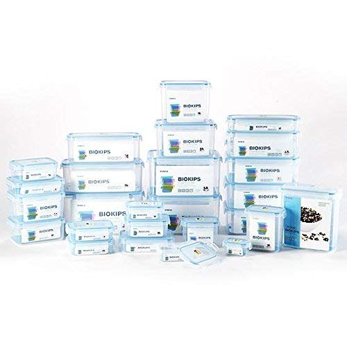 Stackable Komax Biokips storage improves cabinet organization and space efficiency.