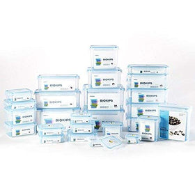 Stackable Komax Biokips storage improves cabinet organization and space efficiency.