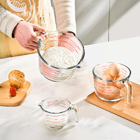 Komuee cup with sturdy ergonomic handle for a secure grip.