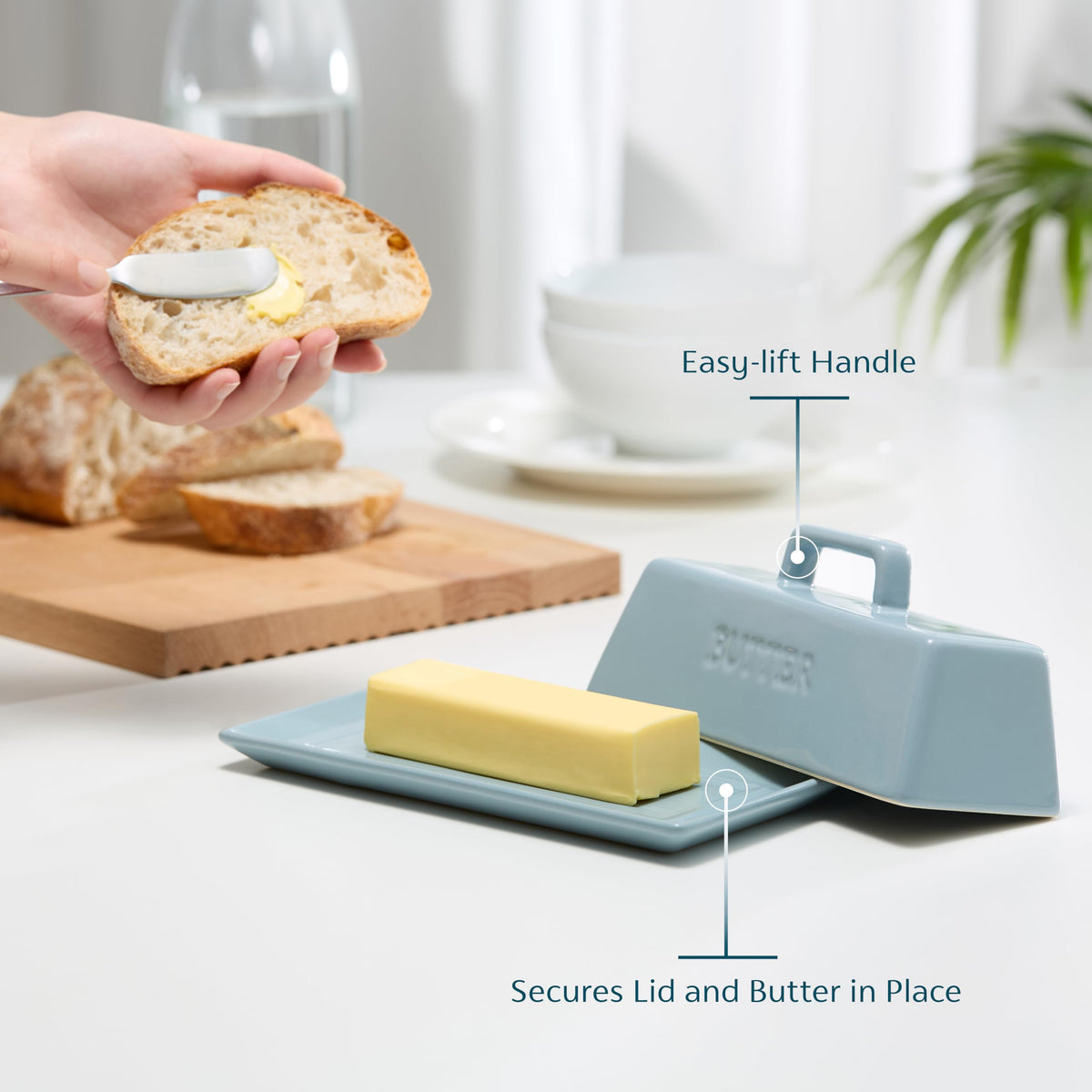 Kook ceramic butter dish on countertop shows squared design for space efficiency.