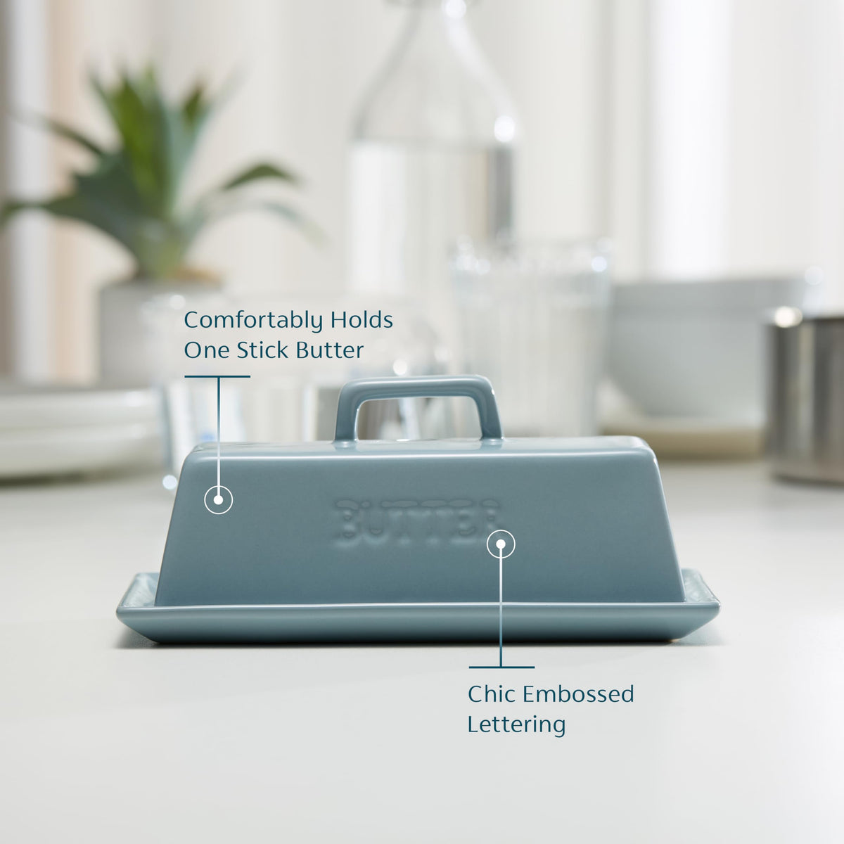 Kook butter dish with top handle demonstrates easy lid lifting.