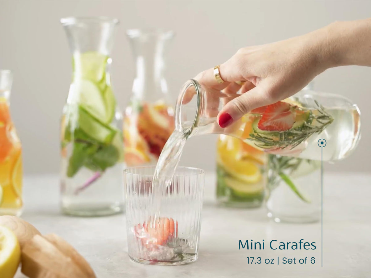 KooK clear glass carafe on table for beverages and presentation.