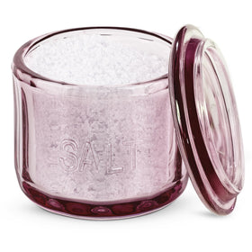 KooK glass salt cellar with pink embossed lid, ready for easy seasoning near the stove