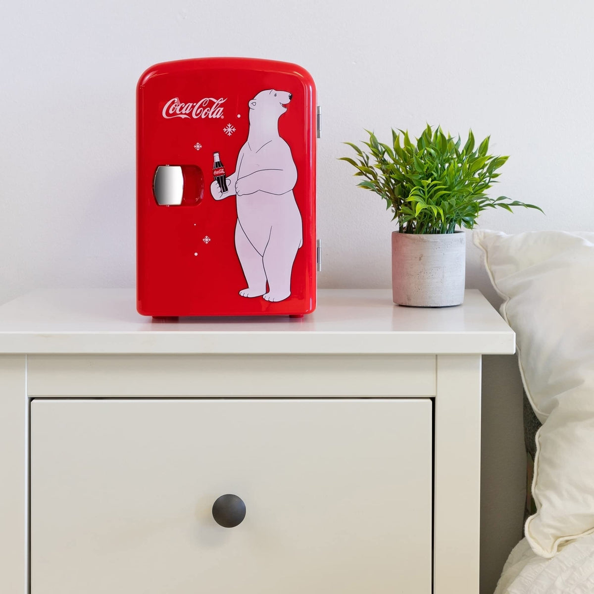 Koolatron Coca-Cola 4L mini-fridge open-lid reveals removable shelf for easy organization.