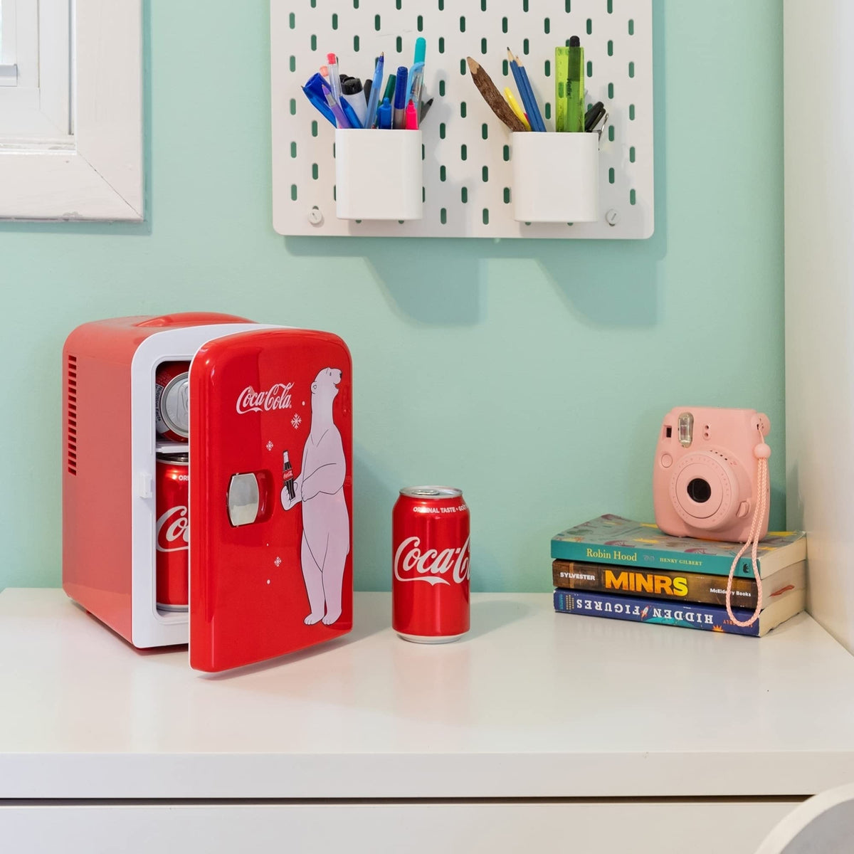 Koolatron Coca-Cola 4L mini-fridge travel-ready photo demonstrates portable cooling for trips.