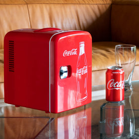Koolatron Coca-Cola mini fridge red interior showing space for six cans